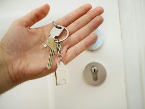 hand holding key